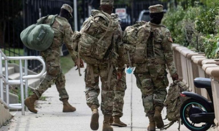 الحرس الوطني يبدأ الوصول إلى واشنطن لاستعادة الأمن